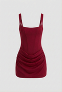 Vibrant red mini dress with corset design by Lumina Wear, featuring fitted silhouette and stylish details for women.