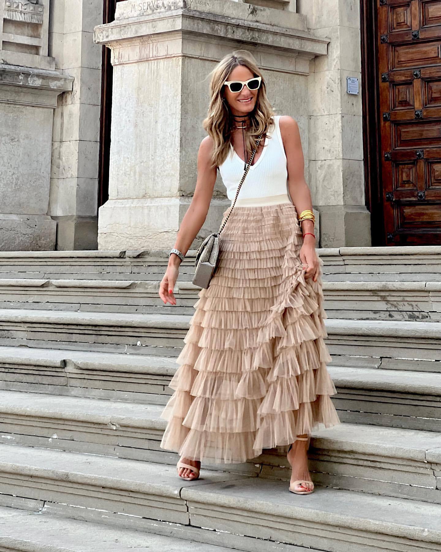 Vintage-inspired black tulle midi skirt by Lumina Wear, featuring a flowing, layered design perfect for elegant outfits.