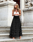 Victoria vintage-inspired black tulle midi skirt by Lumina Wear, showcasing a flowing, elegant design with layered tulle fabric.