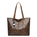 Lumina Wear Victoria vintage-inspired spacious tote bag in khaki with keychain accent, stylish handbag for everyday use.