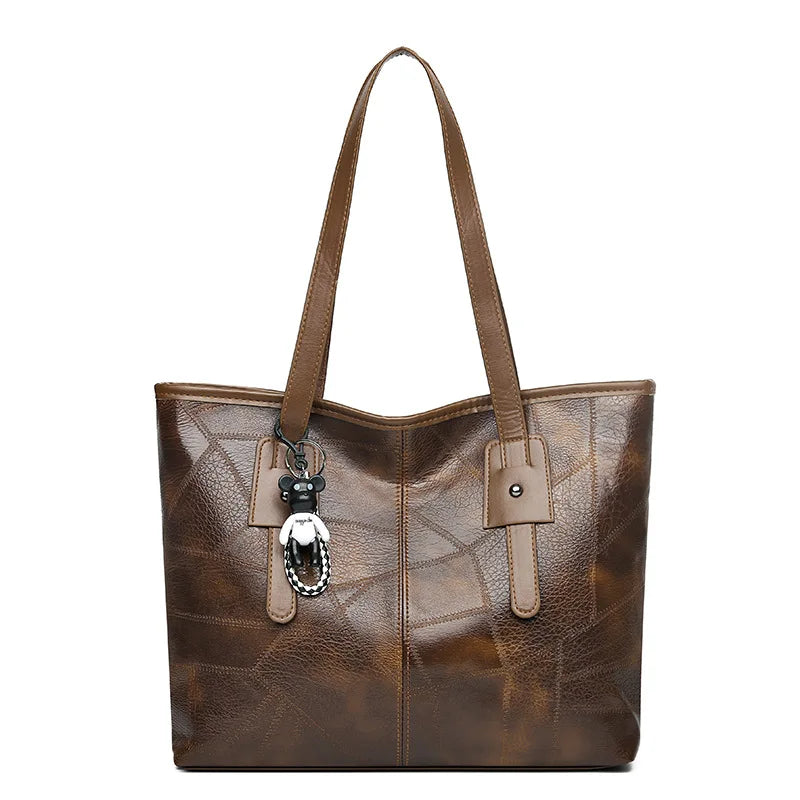 Lumina Wear Victoria vintage-inspired spacious tote bag in khaki with keychain accent, stylish and versatile for everyday use.