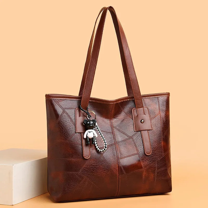 Victoria vintage-inspired spacious tote bag with keychain accent by Lumina Wear, in khaki with hand-stitched details.