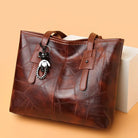 Lumina Wear Victoria vintage-inspired spacious tote bag in khaki with keychain accent, stylish handbag with ample storage.