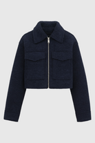 Victoria vintage navy zip jacket with classic lapel from Lumina Wear, shown on a model in navy blue.