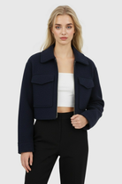 Victoria vintage navy zip jacket with classic lapel by Lumina Wear, displayed on a mannequin in navy blue.