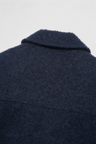 Victoria vintage navy zip jacket with classic lapel from Lumina Wear, shown on a mannequin in navy blue.