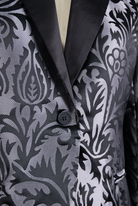 Vivienne black and silver jacquard tuxedo blazer with satin lapel by Lumina Wear, shown on a model.