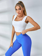 White Lumina Vancouver sports bra with wide shoulder straps, designed for comfort and support during athletic activities.