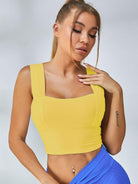 White Lumina Vancouver sports bra with wide shoulder straps, designed for support and comfort during athletic activities.