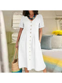 White Yasmin Effortless Buttoned Dress by Lumina Wear, featuring a stylish design, displayed on a hanger.
