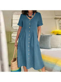 White Yasmin Effortless Buttoned Dress by Lumina Wear, shown on a model with a casual, stylish fit.