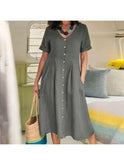 White Yasmin Effortless Buttoned Dress by Lumina Wear, showcasing a stylish, casual dress with button details and relaxed fit.