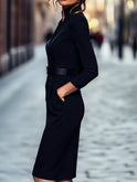 Black Lumina Wear belted sheath midi dress with mandarin collar, featuring a sleek, fitted design and stylish waist belt.
