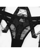 Black Zephyra 3-piece lingerie set by Lumina Vancouver, includes bra, panties, and garter belt, displayed on a mannequin.