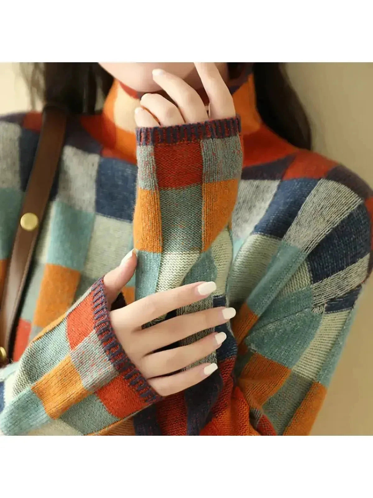 Lumina Wear Zuna sweater featuring a cozy knit design in a neutral color, perfect for casual or layered winter outfits.